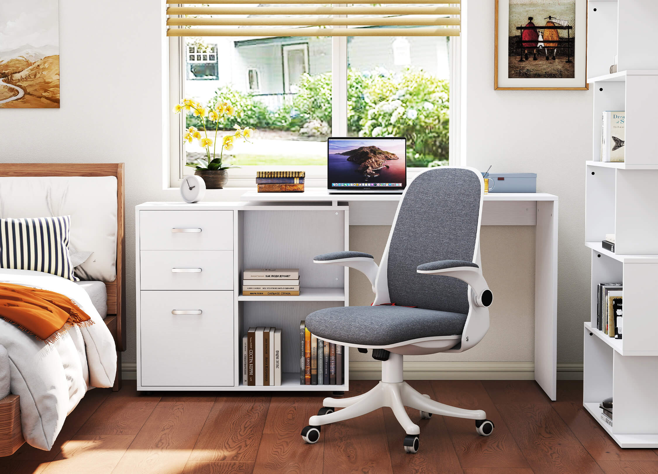 Modern bedroom with a desk, chair, and window view of greenery