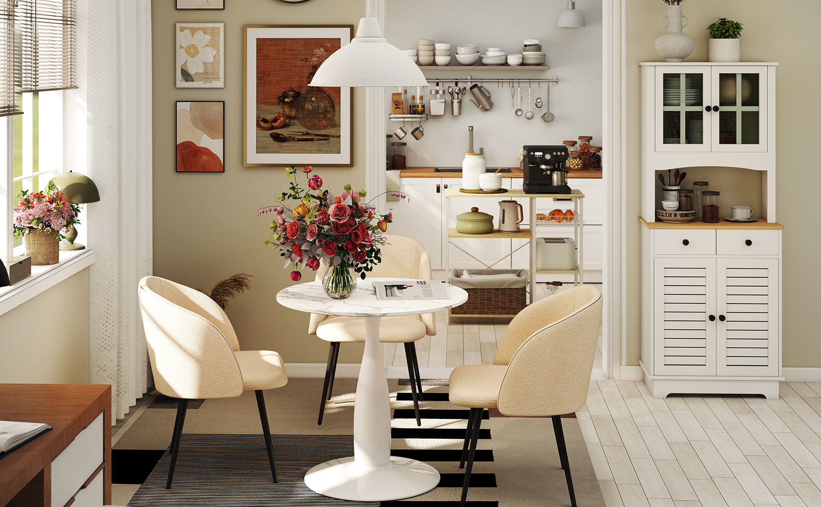 Modern kitchen with white cabinets, a round dining table, and decorative elements.