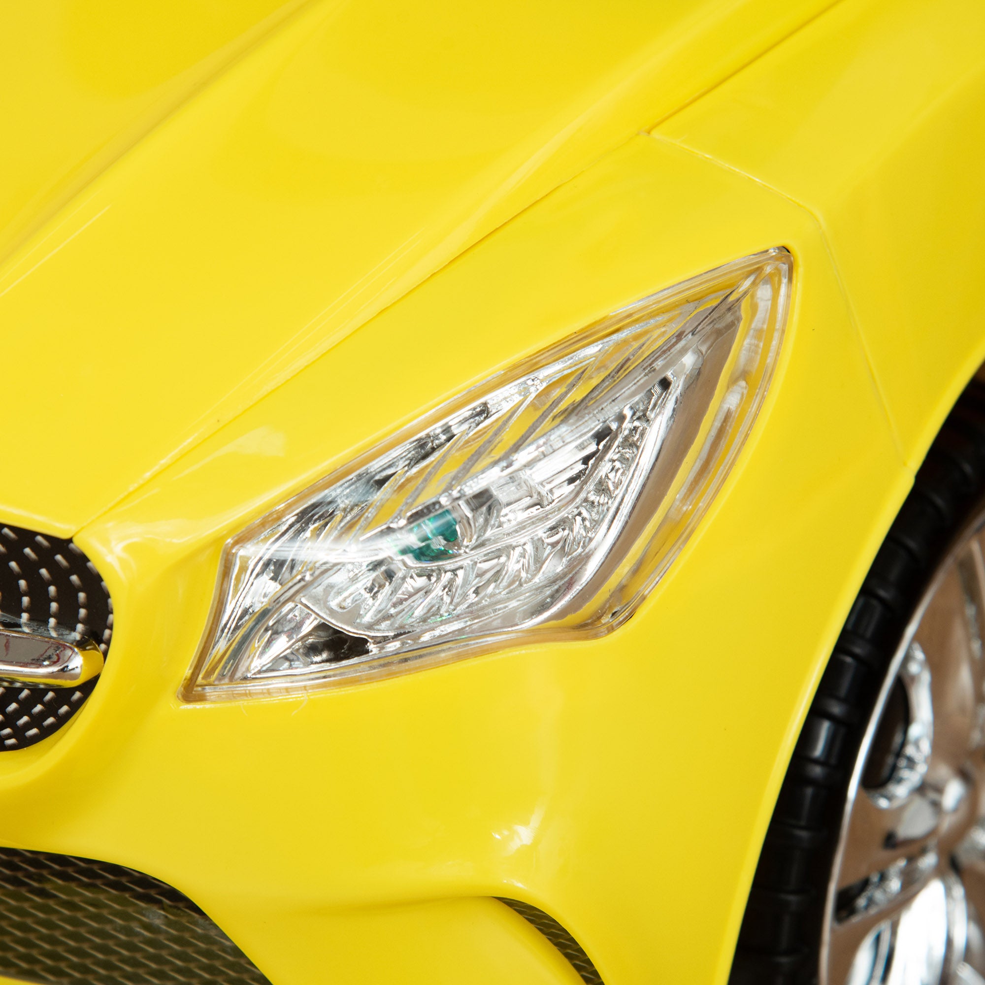 Ride-On Car for Kids with Steering Wheel, Headlights, and Integrated Music, Car for Kids in PP and Metal, 63.5x28x36 cm, Yellow