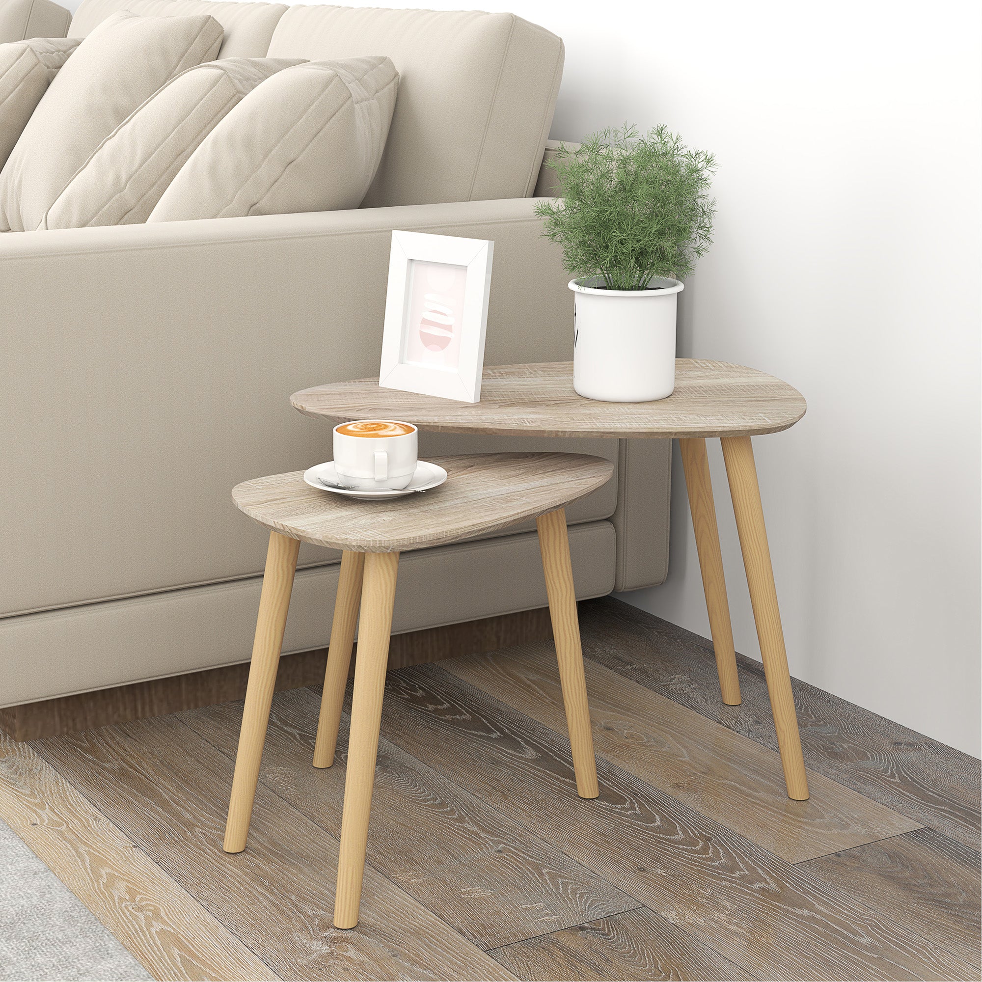 Set of 2 Scandinavian design nested coffee tables with wooden legs and wooden top, natural look
