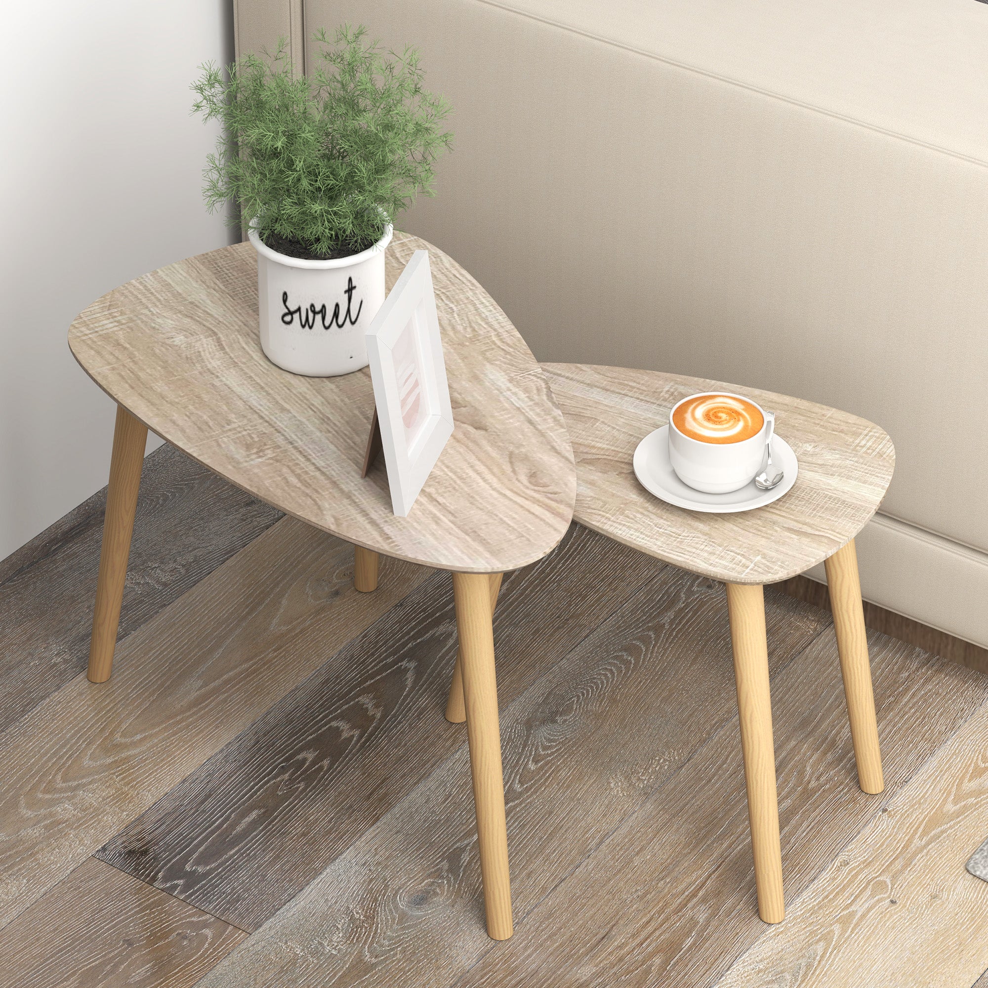 Set of 2 Scandinavian design nested coffee tables with wooden legs and wooden top, natural look