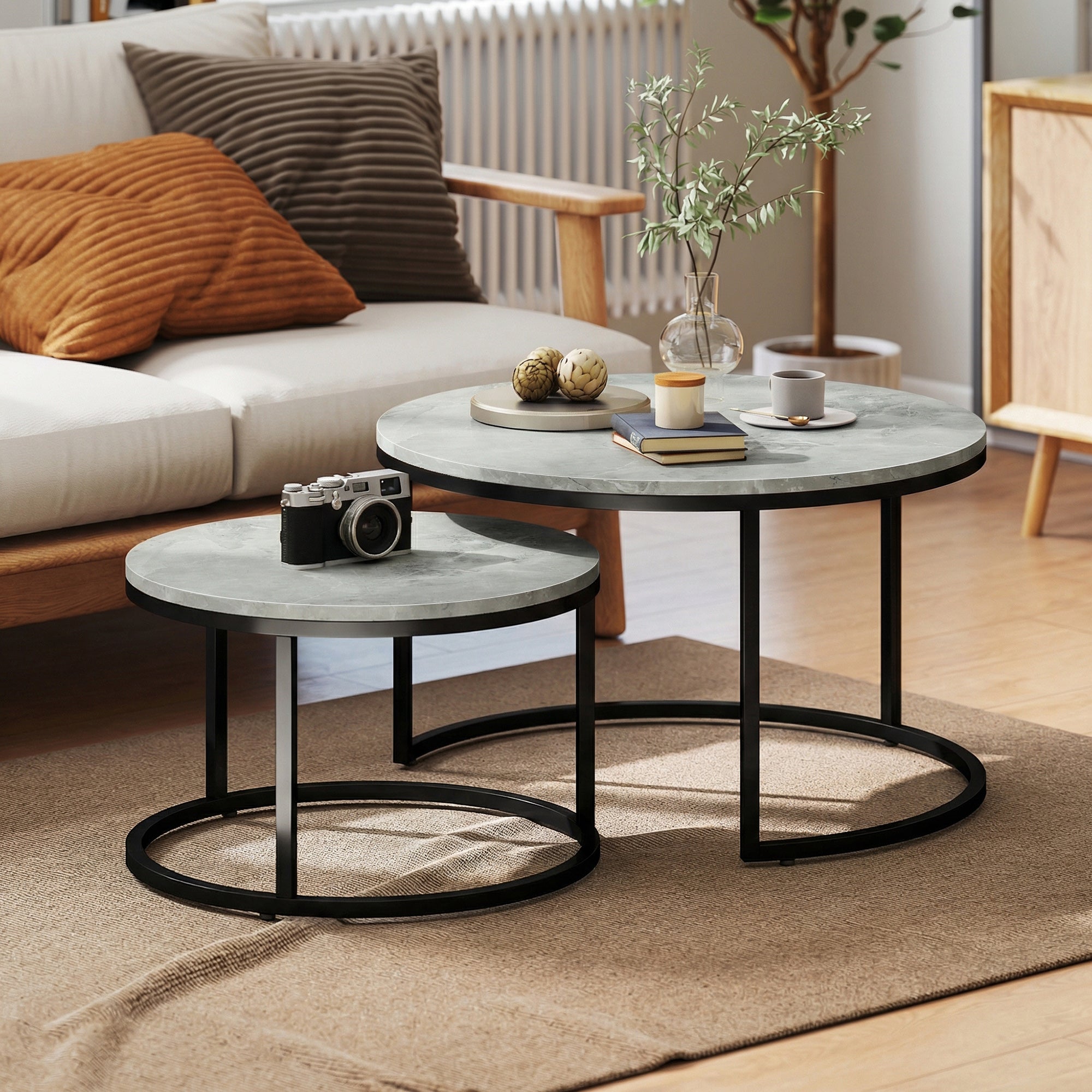 Set of 2 Nesting Round Coffee Tables — Stackable Industrial Design, Black Metal Legs, Gray Cement Top