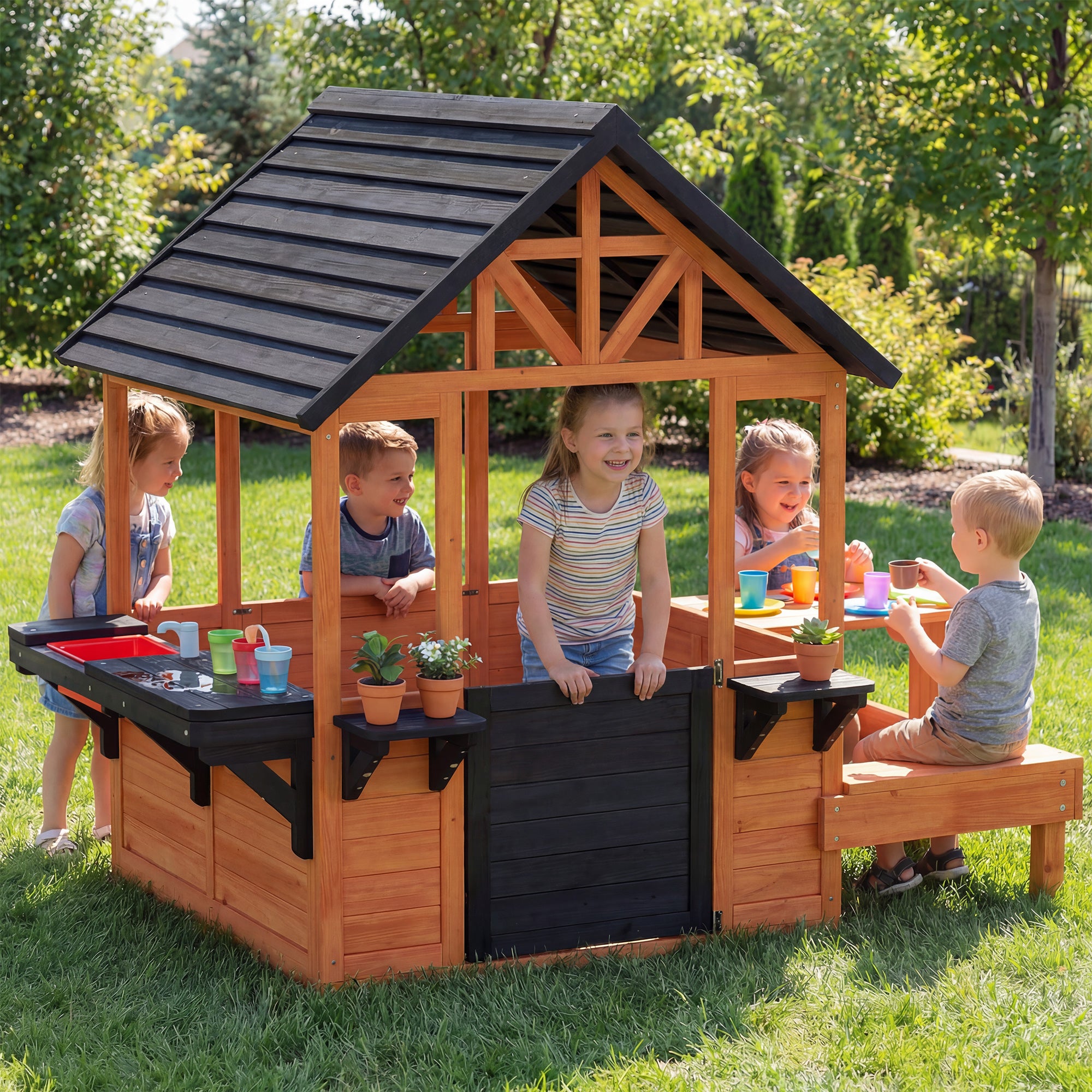 Wooden Outdoor Playhouse for Kids — Table, Benches, Sink, Door, Window & Flower Boxes, Brown, 166.3 x 112.5 x 139.7 cm (65.5 x 44.3 x 55.0 in)