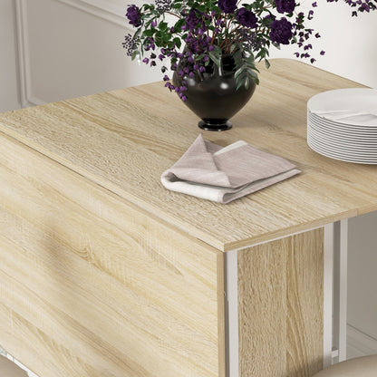 Folding Dining Table, Extendable Table for 4-6 Persons, Space Saving Modern Kitchen Table with Shelf and 6 Wheels, Made of Metal, 130x80x74 cm, Wood Color