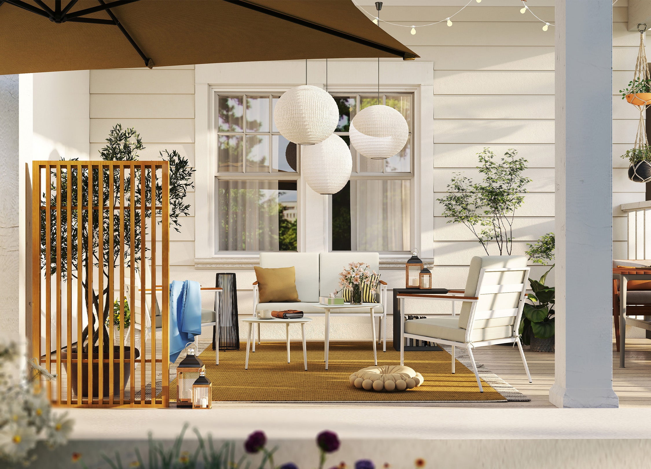 Outdoor patio area with furniture, plants, and decorative elements.