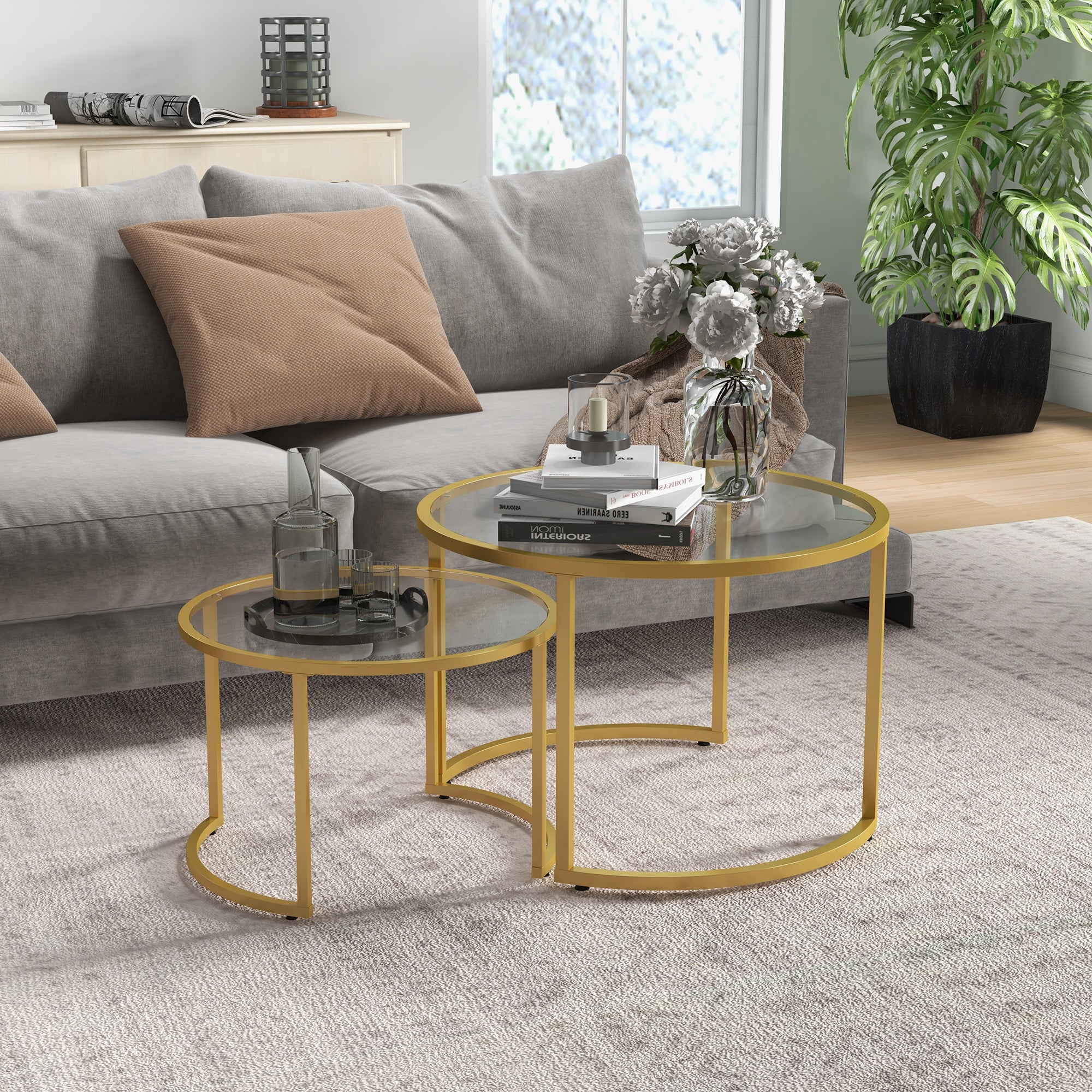 Set of 2 modern round nested coffee tables 70/54 cm tempered glass top and golden carbon steel base