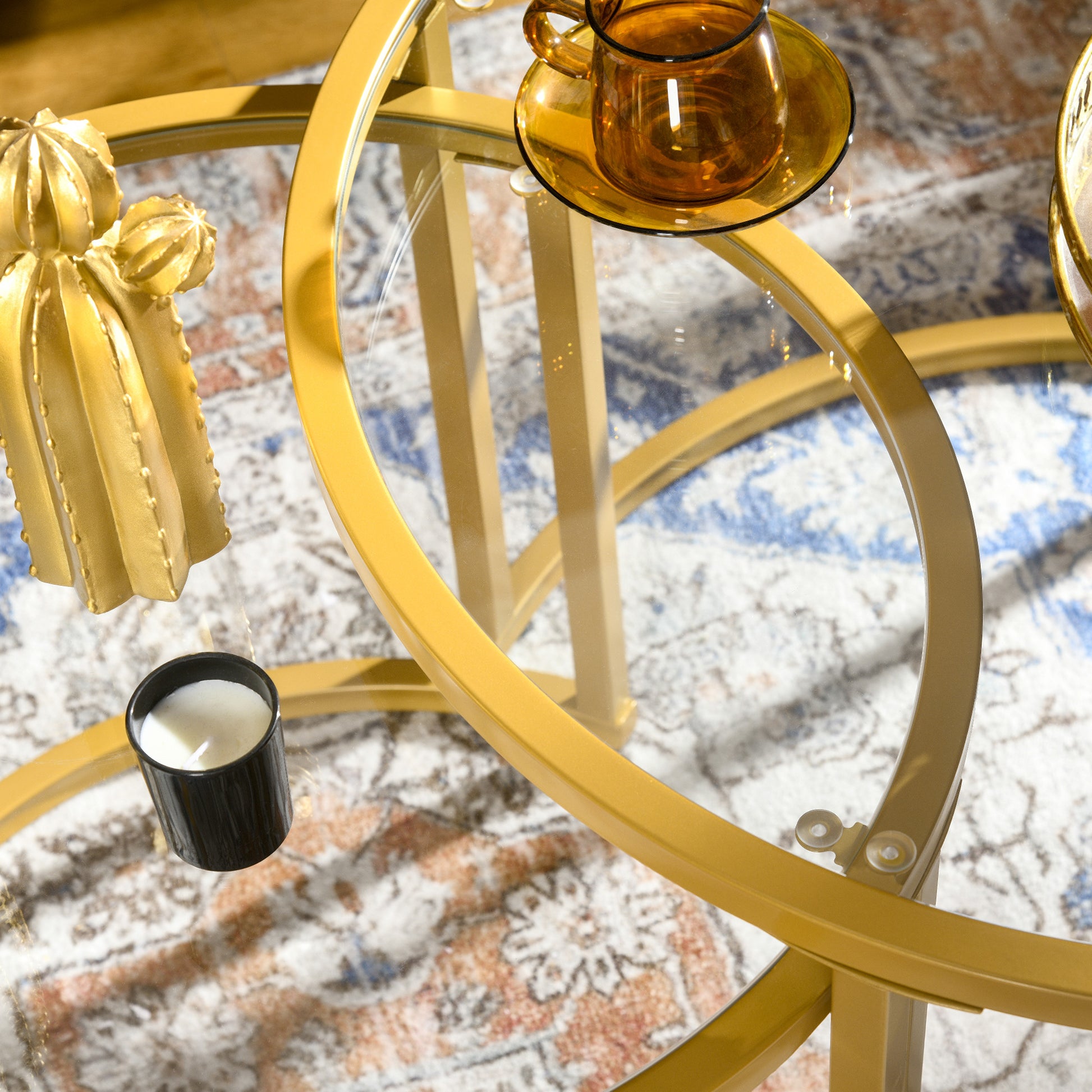 Set of 2 modern round nested coffee tables 70/54 cm tempered glass top and golden carbon steel base