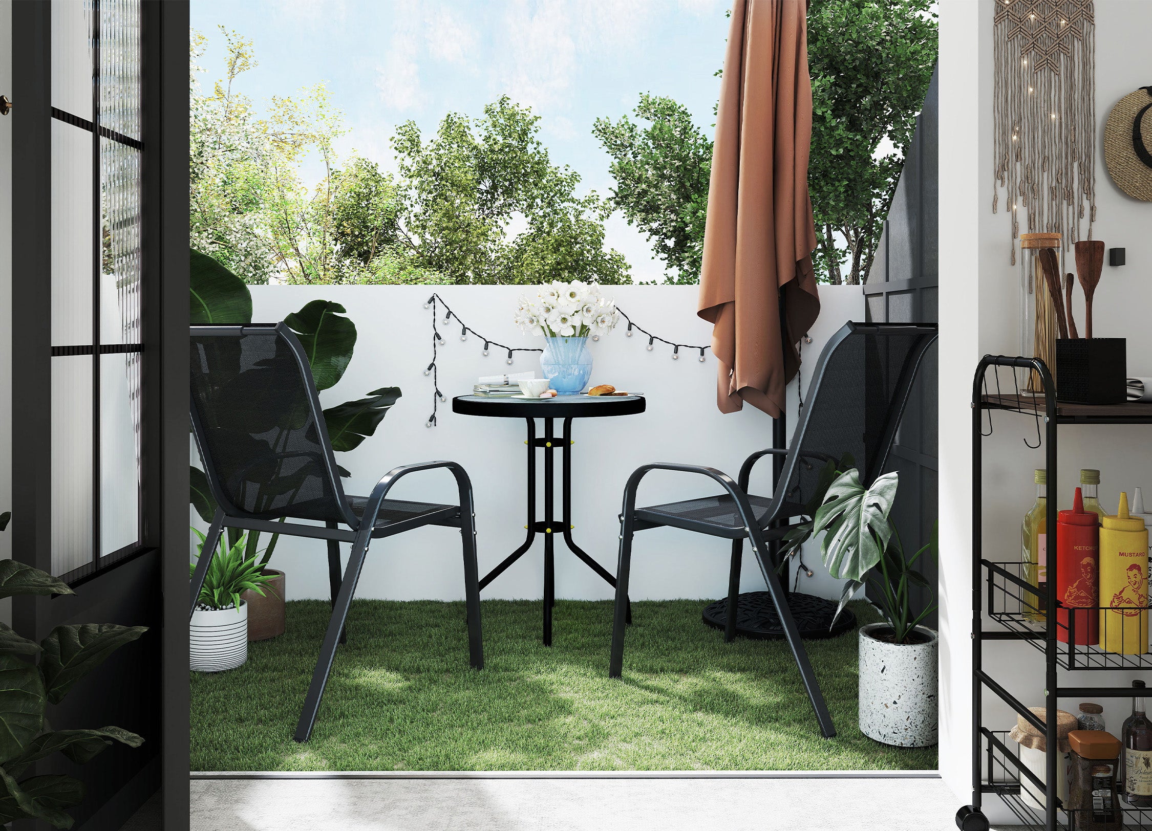 Outdoor patio with black chairs and table, plants, and a small shelf.