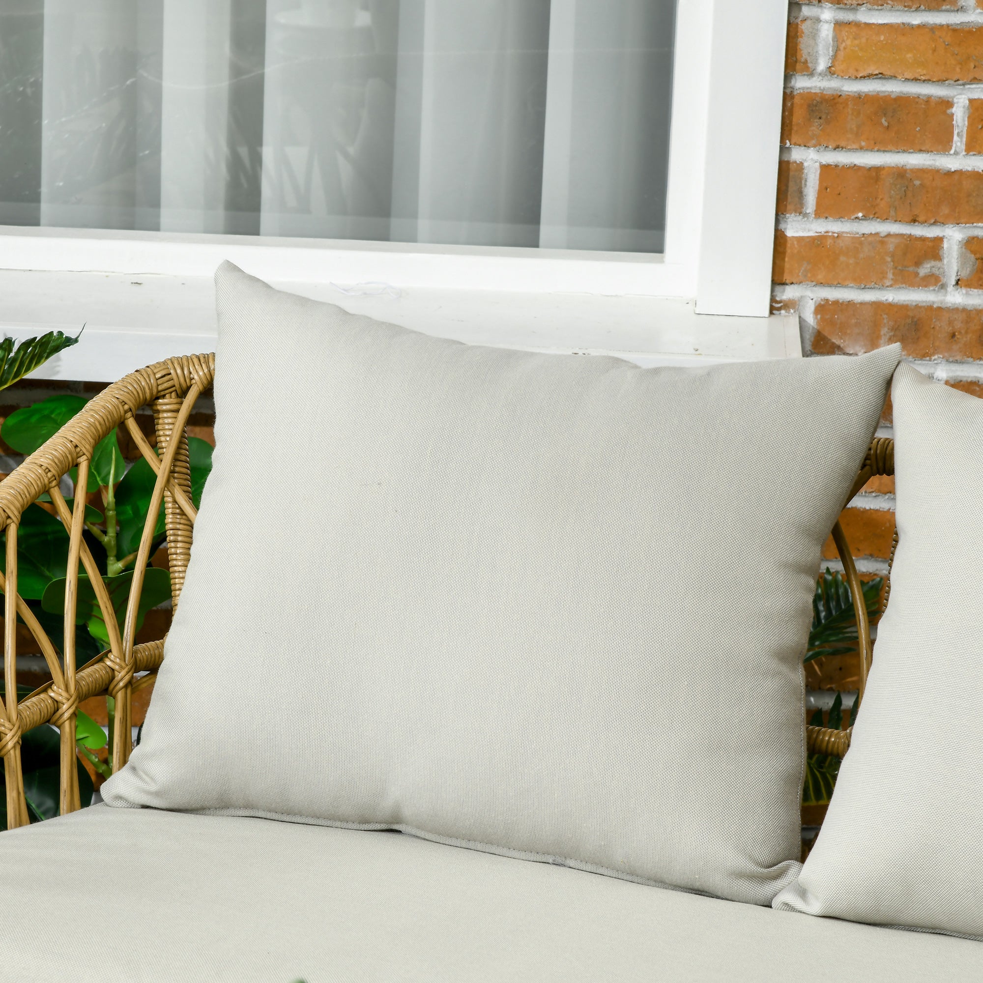 4-Piece Garden Set in Resin Wicker 2-Seater Sofa + 2 Armchairs + 1 Coffee Table with Tempered Glass Top 7 Cushions - Steel Frame - Sand and Cream