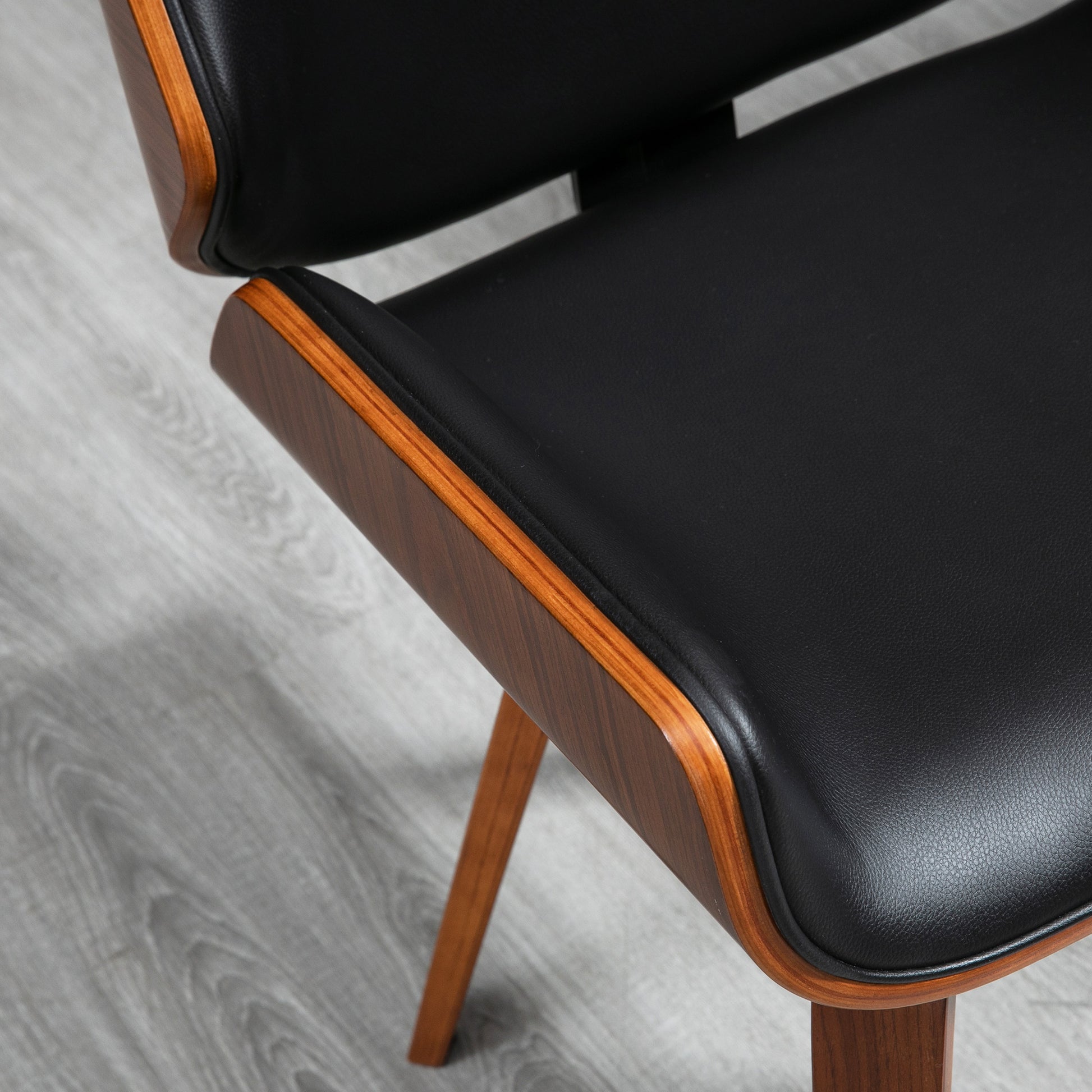 Set of 2 vintage style dining chairs with black synthetic covering seat and wooden legs