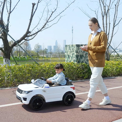 SUV Electric Car for Kids 3-6 Years Battery-Powered Car 12V with 2 Motors Remote Control Headlights Horn Music USB and Door Opening 3-5 km/h 110x68x52 cm White