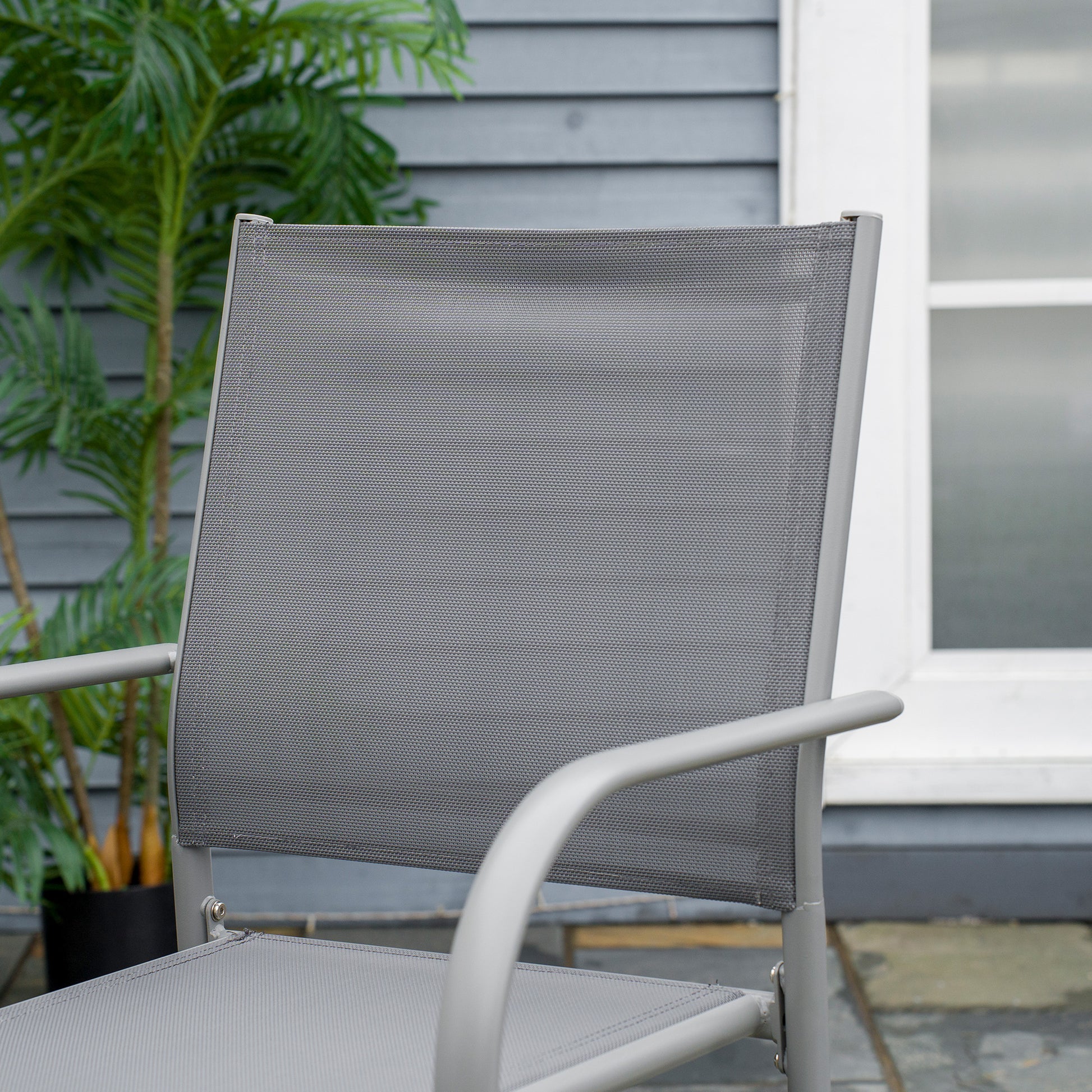 6-Person Garden Set with 1 Table and 6 Chairs Steel Outdoor Dining Set 7 Pieces Stackable Chairs Tempered Glass Top Gray