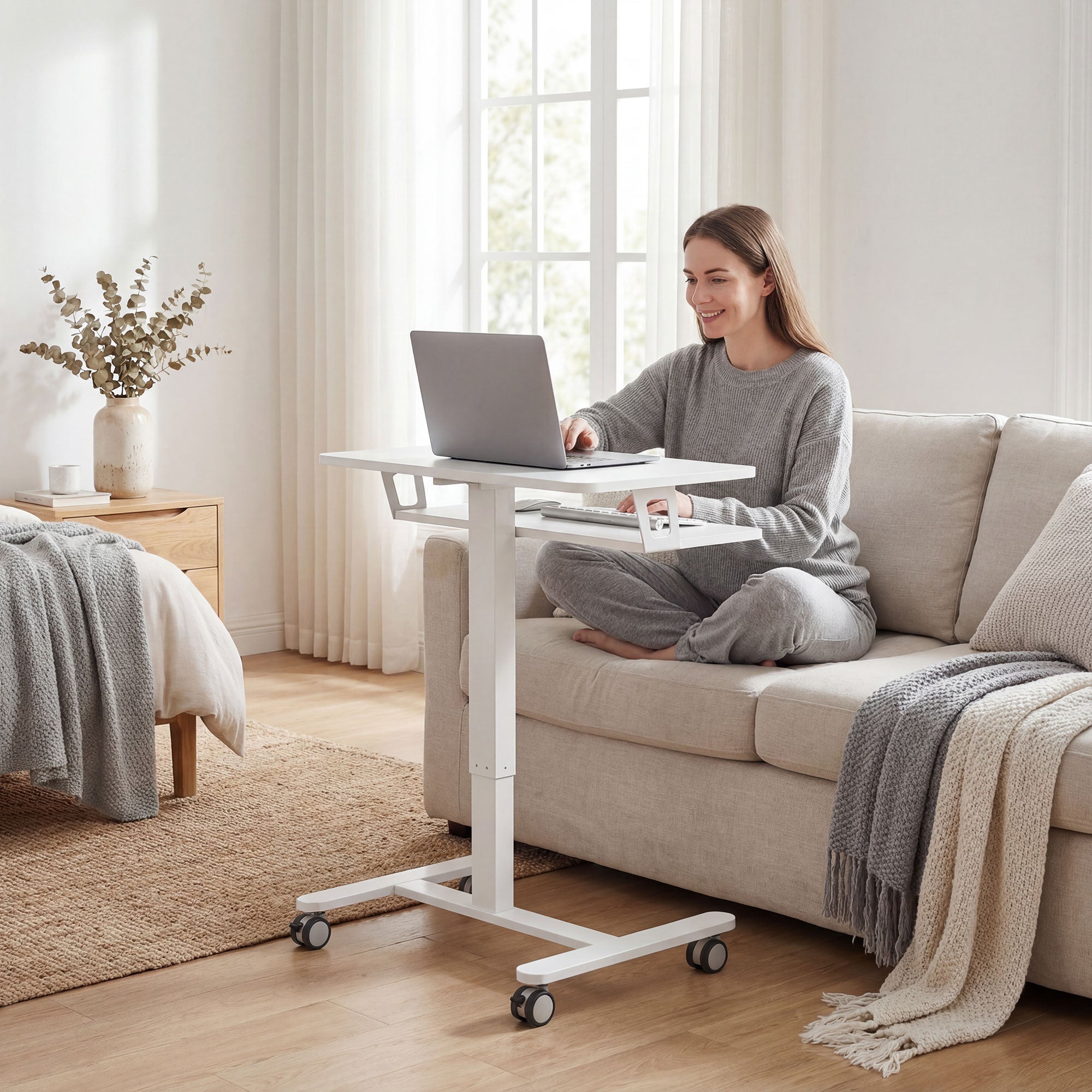 Height-Adjustable Rolling Standing Desk 28–42 in with Keyboard Tray, Steel Frame — Compact White
